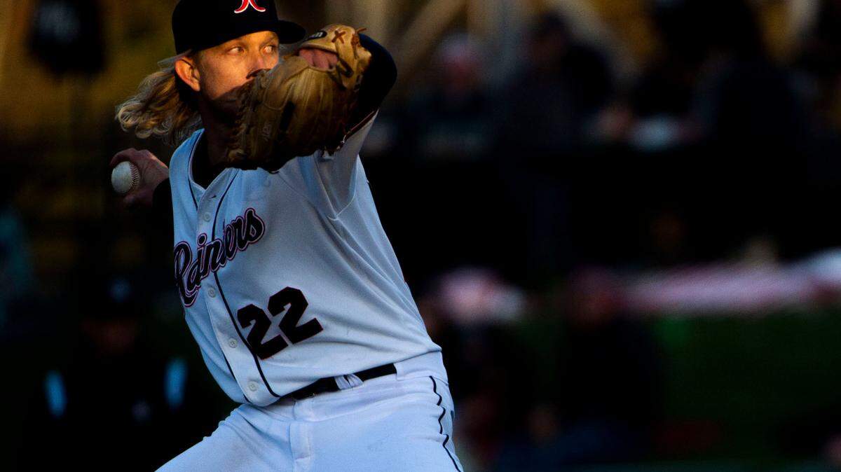 Tacoma Rainiers starter Darren McCaughan (22) delivers a pitch to a Salt Lake Bees batter during the second inning of the season opener at Cheney Stadium in Tacoma, Wash., Tuesday, April 5, 2022.