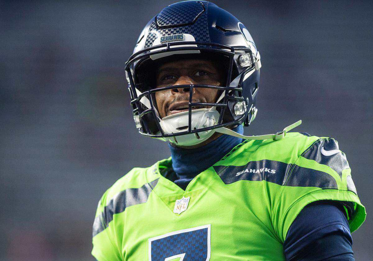 Seattle Seahawks quarterback Geno Smith (7) smiles at fans before the start of an NFL game against the San Francisco 49ers at Lumen Field in Seattle Wash. on Dec. 15, 2022.