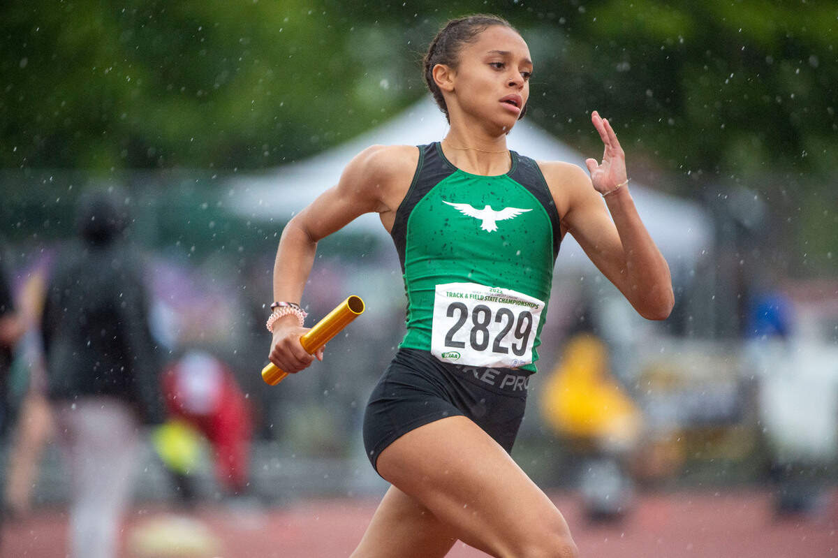 Tumwater’s Mariah Jett runs the first leg of a 2A girls 4x200 preliminary heat at the State 2A, 3A, 4A track and field championships on Thursday, May 26, 2022, at Mount Tahoma High School in Tacoma Wash. Tumwater finished the day with the fastest time, 1 minute, 45.74 seconds.
