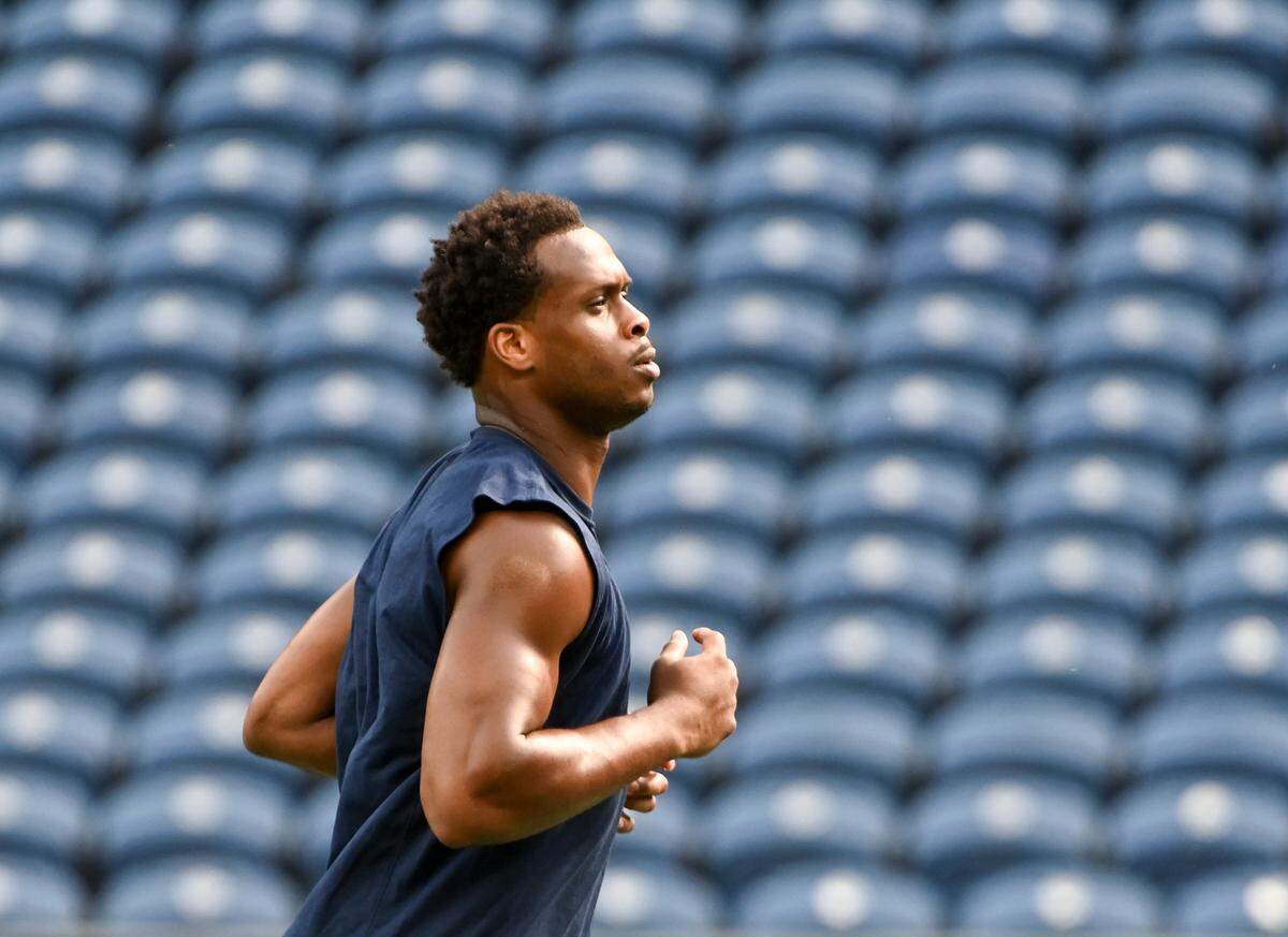 Seattle Seahawks quarterback Geno Smith (7) warms up before the NFL game against the Los Angeles Rams at Lumen Field, Sunday, Sept. 10, 2023, Seattle, Wash.
