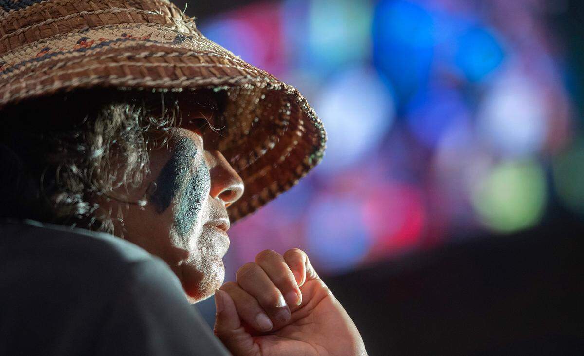 A Quileute drummer performs during the Canoe Journey 2023 Protocol at the Muckleshoot Pow Wow Grounds events center in Auburn, Washington, on Thursday, Aug. 3, 2023.
