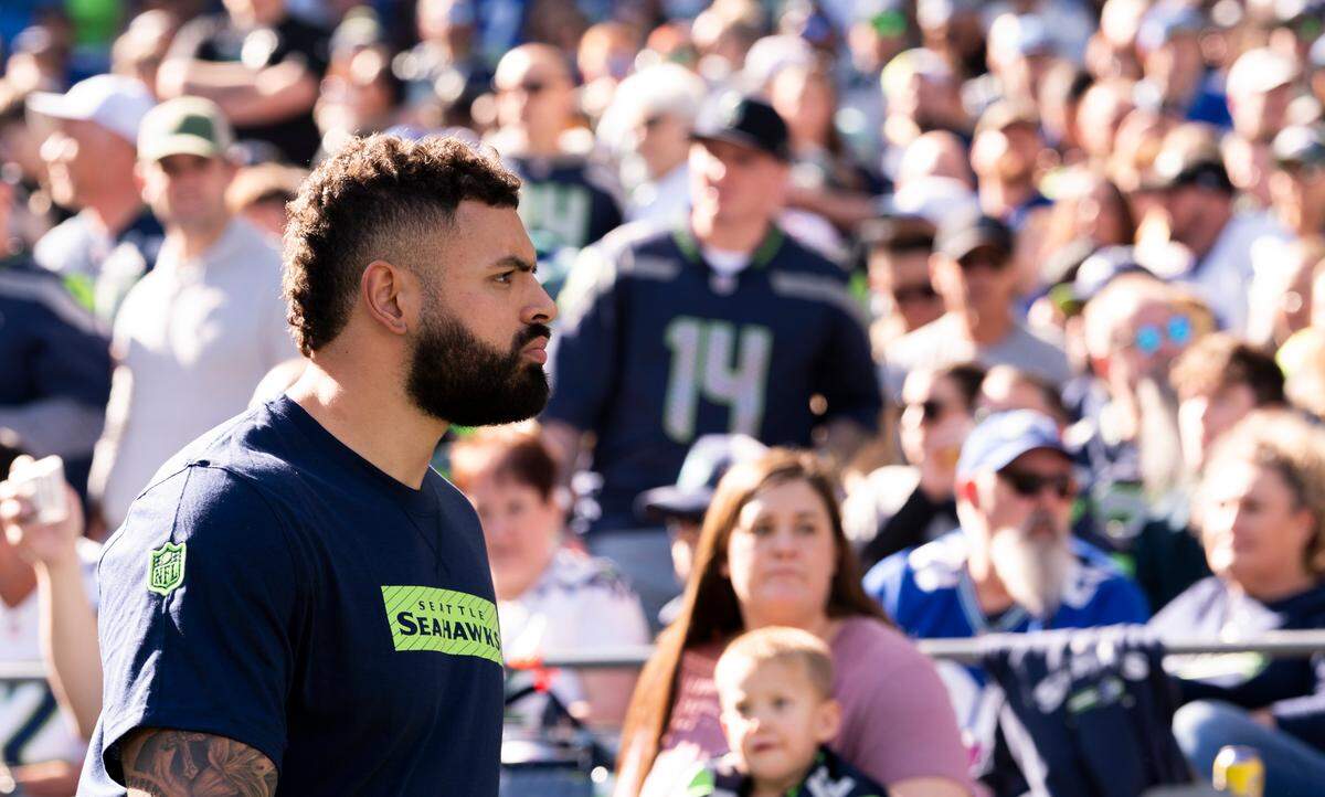 Seattle Seahawks offensive tackle Abraham Lucas (72) walks on the sidelines before the game against the New York Giants at Lumen Field, on Sunday, Oct. 6, 2024 in Seattle, Wash.