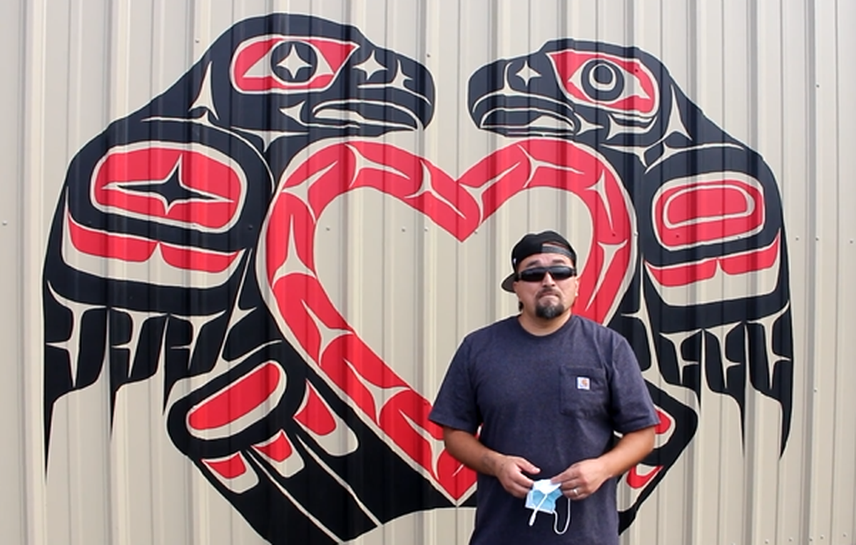 Lummi Nation artist Jason LaClair discusses the meaning behind his piece, “One From the Heart,” which features two eagles facing each other in the shape of a heart in a traditional Coast Salish style. The piece, now on display at Pioneer Park in Ferndale, represents mutual care within the community during the COVID pandemic. It is one of two new murals representing the Lummi community and history as part of the city’s Downtown Mural Project.