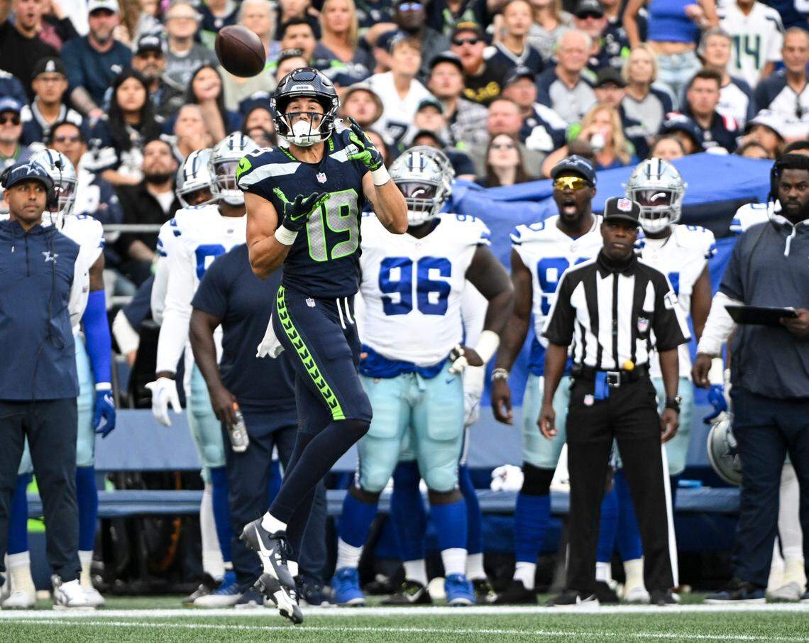 Seattle Seahawks wide receiver Jake Bobo (19) hauls in a reception from Geno Smith during the first quarter of the preseason game against the Dallas Cowboys at Lumen Field, Saturday, Aug. 19, 2023, in Seattle.