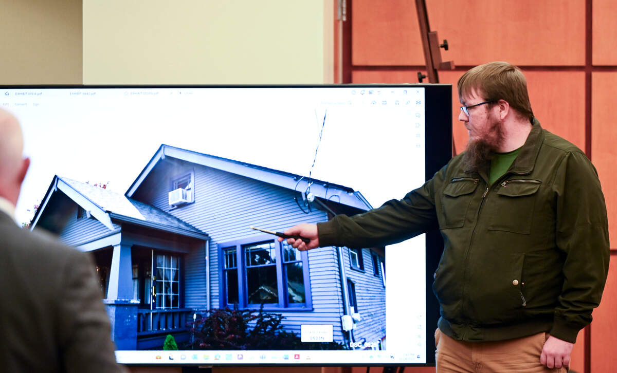 Kennett Ashford-White, an eyewitness to Manny Ellis’ fatal encounter with police in 2020, points to where he lived at the time.