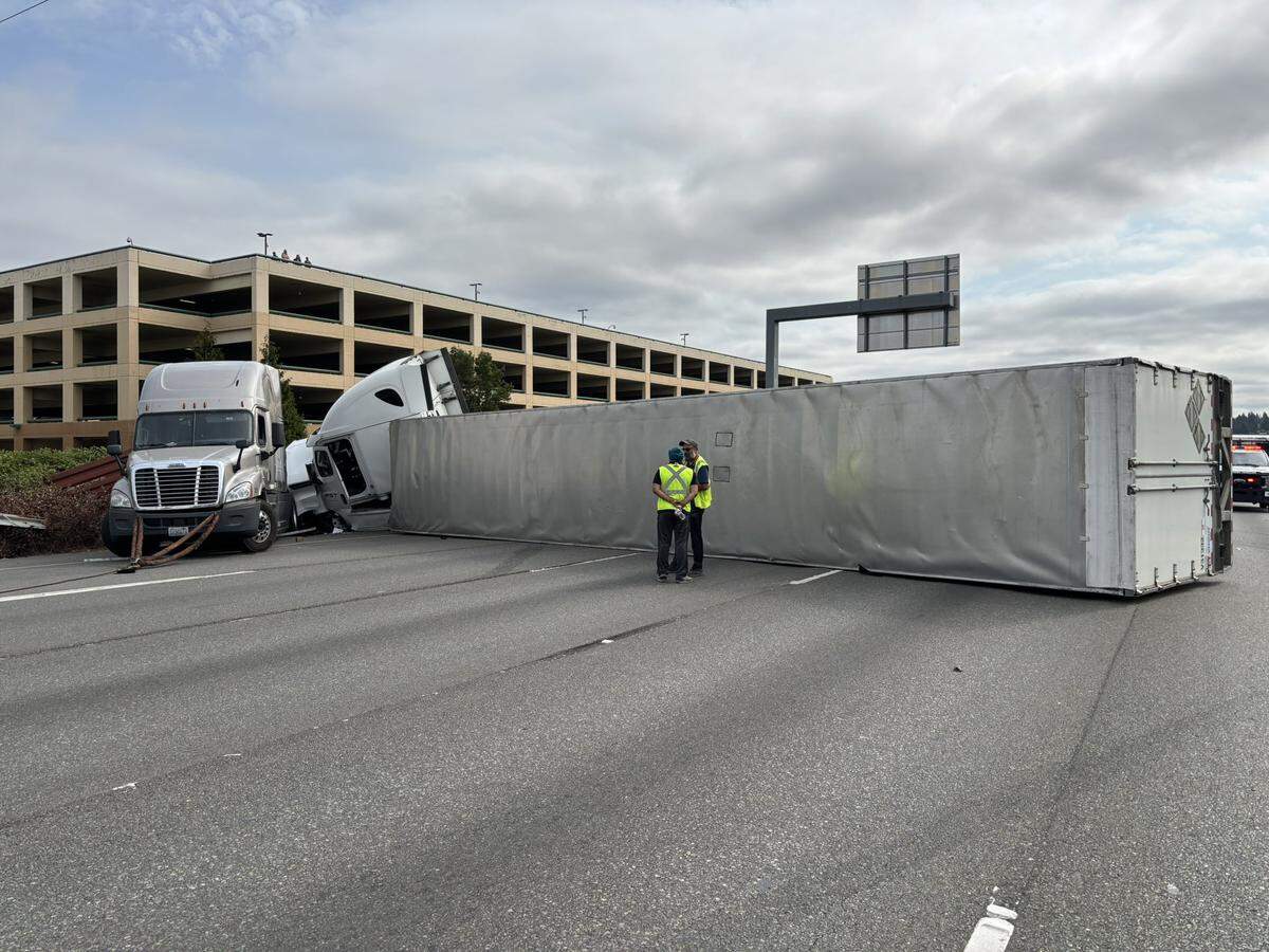 A three semi-truck, two-car crash blocked southbound Interstate 5 near Fife, Washington, on Friday, Aug. 1, 2025