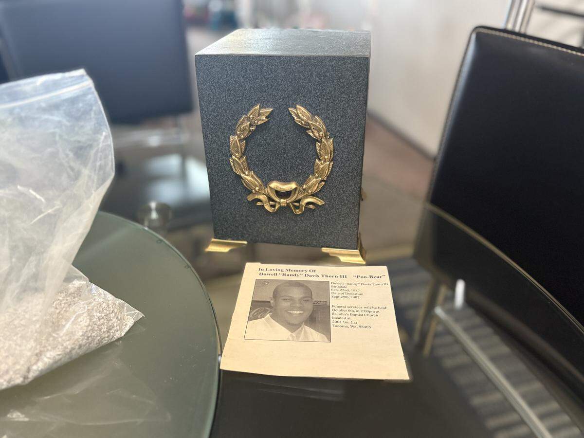 The gray and golden urn containing Randy’s cremated remains are pictured here. Eighteen years after she thought she had received all of his remains, Tiffani Robinson was notified that there were leftover cremations at a local funeral home.