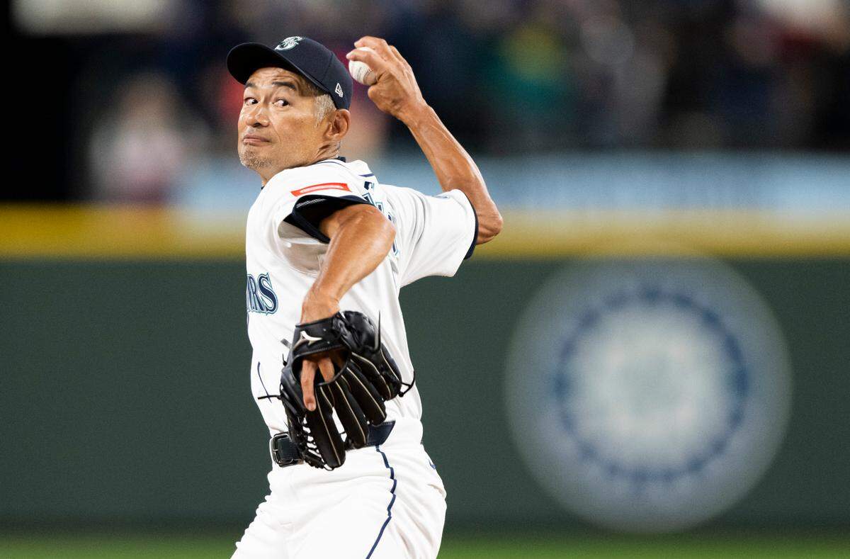 Former Seattle Mariners outfielder Ichiro Suzuki throws out the first pitch before the opening day game against the Oakland Athletics at T-Mobile Park, on Thursday, March 27, 2025, in Seattle, Wash.