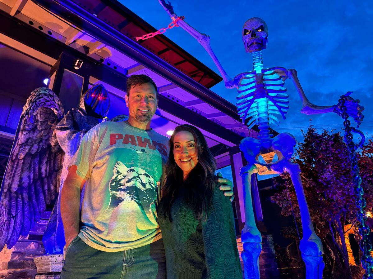 Paul and Chrisy Vindivich outside their home in the 5300 block of North 47th Street in Tacoma. One of their many Skellys is at right. &nbsp;&nbsp;