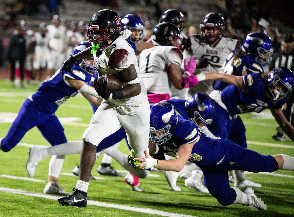Bethel’s Roy Lockley III (3) runs in Bethel’s game-winning touchdown late in the second half of the game against Puyallup at Sparks Stadium, Thursday, Oct. 12, 2023, in Puyallup, Wash.