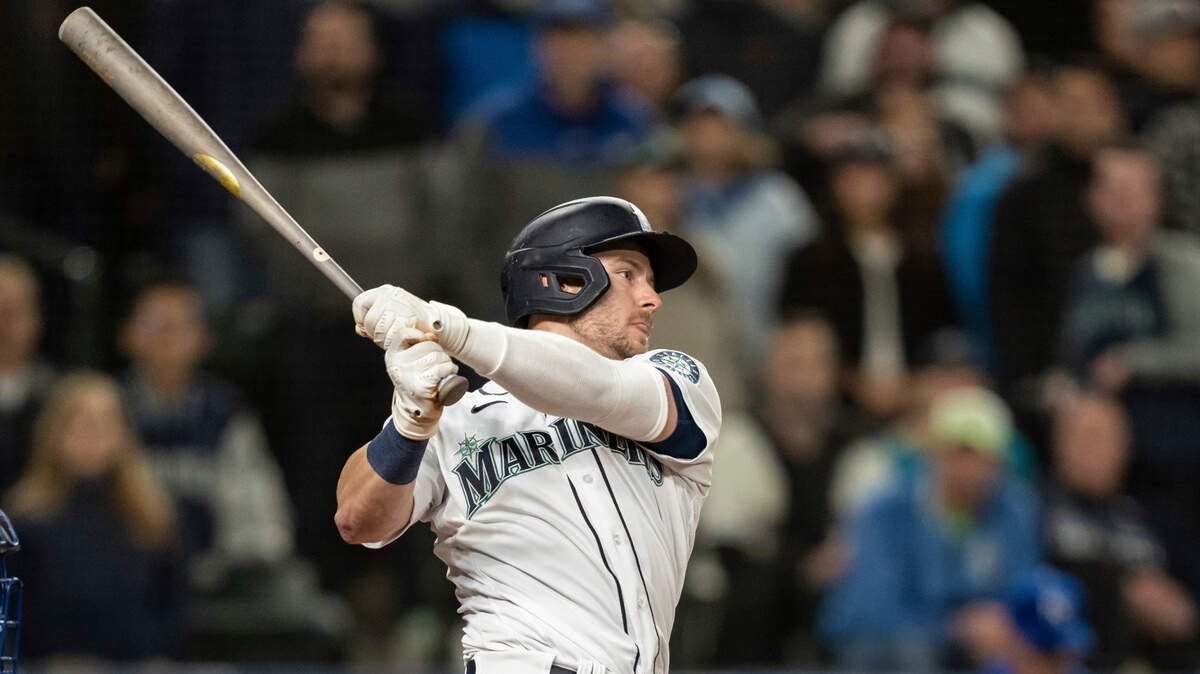 Seattle Mariners’ Jarred Kelenic takes a swing during an at-bat in a baseball game against the Kansas City Royals, Saturday, April 23, 2022, in Seattle. The Mariners won 13-7. (AP Photo/Stephen Brashear)