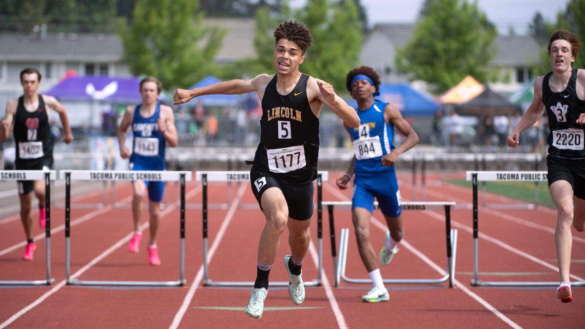 Lincoln’s Jonathan Frazier runs to a state title in the 3A boys 300-meter hurdles during the final day of the WIAA state track and field championships at Mount Tahoma High School in Tacoma, Washington, on Friday, May 26, 2023.