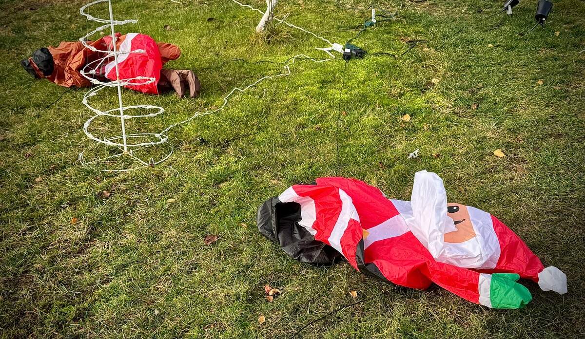 A deflated Santa in the front yard of a North End Tacoma home was one of the many casualties of Saturday’s wind storm.