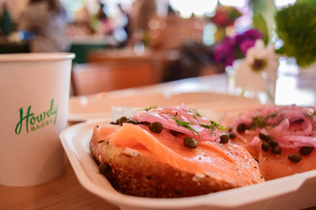 The writer enjoyed a Lox in a Box on a rosemary sea salt bagel Wednesday morning while making friends with strangers she joined at a table inside the South Tacoma shop in a glimmer of late-morning sun.