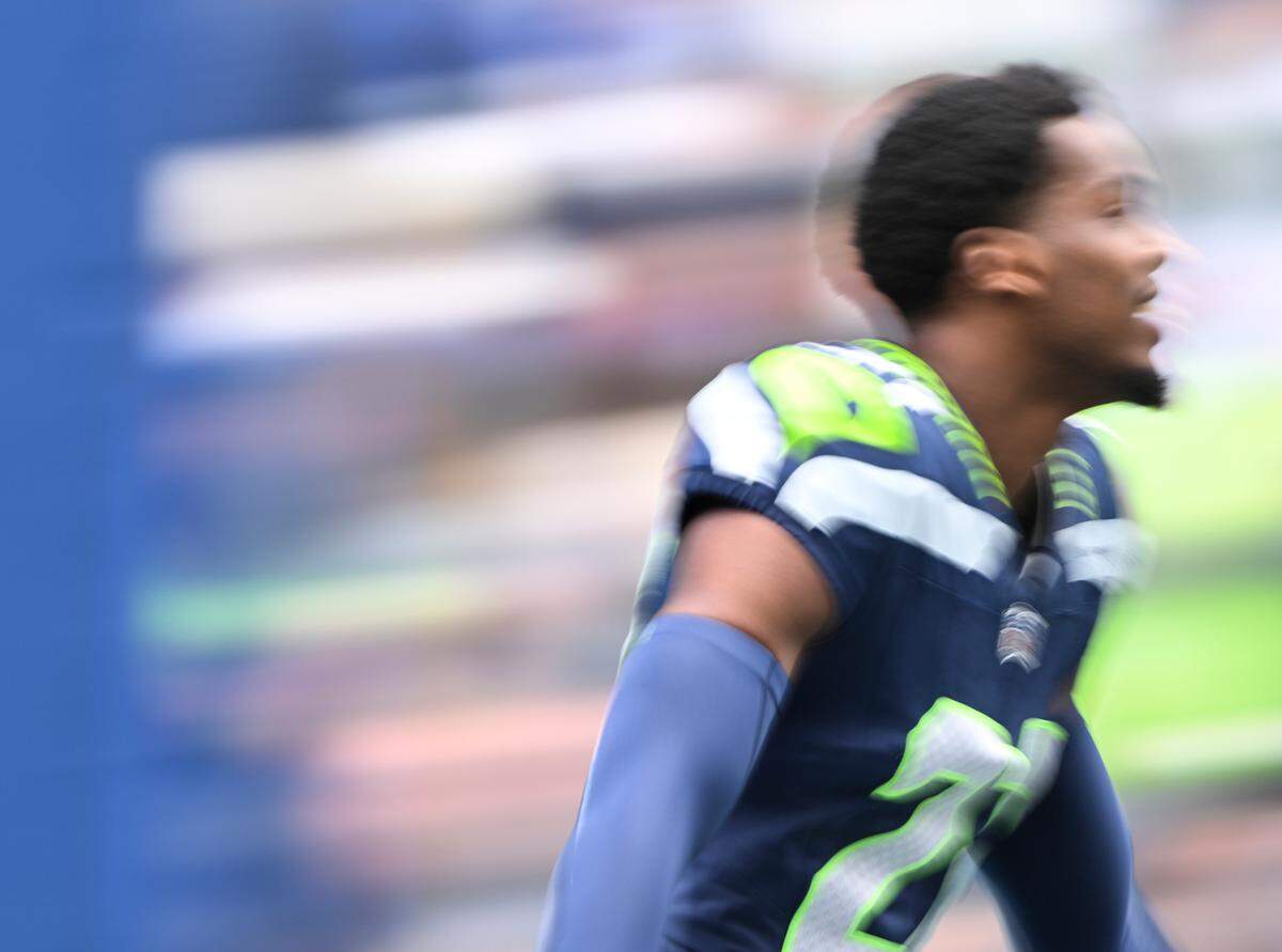 Seattle Seahawks cornerback Devon Witherspoon (21) is announced before the game against the Arizona Cardinals at Lumen Field, Sunday, Oct. 22, 2023, in Seattle, Wash.