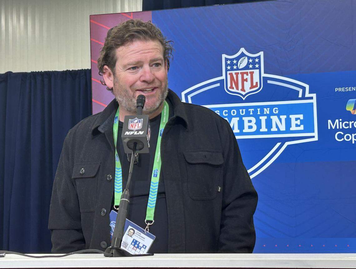 Seahawks general manager John Schneider speaks to reporters at the NFL scouting combine Tuesday, Feb. 24, 2026, from a podium inside the Indiana Convention Center in Indianapolis.