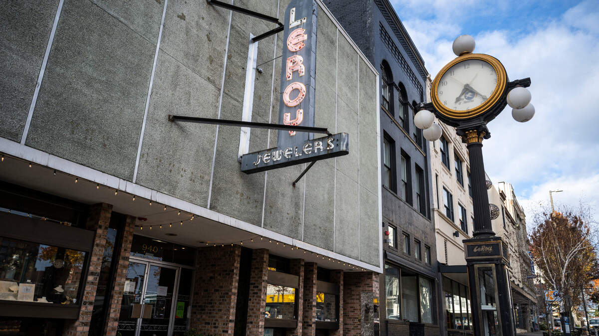 A 102-year-old street clock sits outside LeRoy Jewelers on Broadway Plaza in Tacoma, Wash. on Dec. 21, 2022. The clock was shut down earlier this year because its gears are in need of repair. The Tacoma City Council recently approved $35,000 for the repairs.