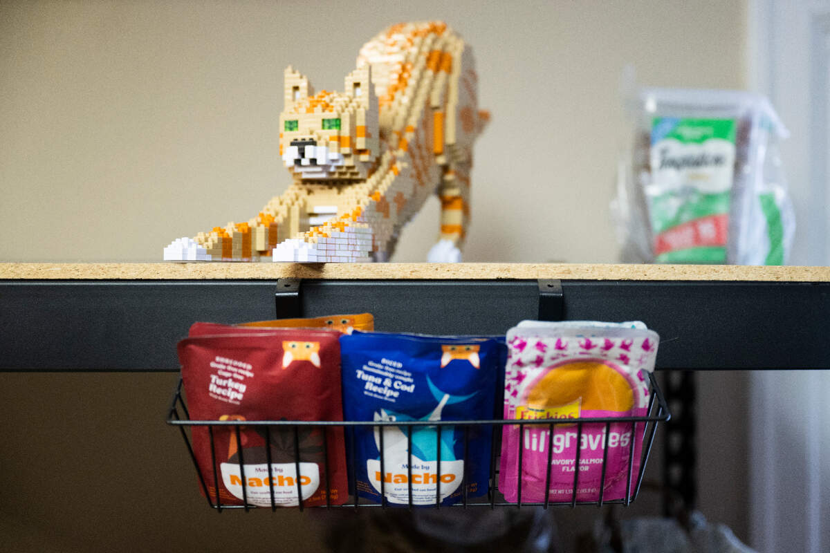 Soft and canned foods are organized at Puget Sound Pet Food Bank, on Wednesday, Dec. 11, 2024, in Tacoma, Wash.