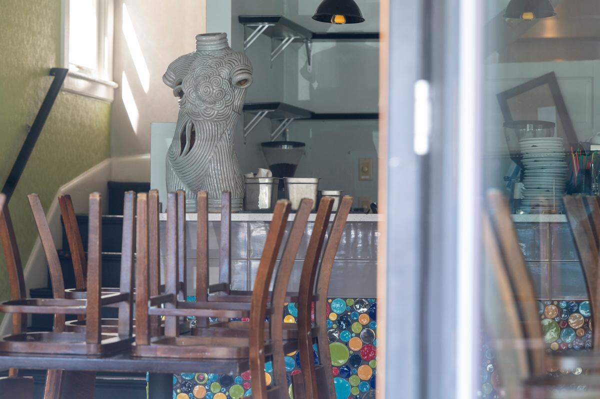 The inside of Art House Cafe, adorned with artistic details and pieces thanks to the owners’ backgrounds, was quiet on Monday afternoon.