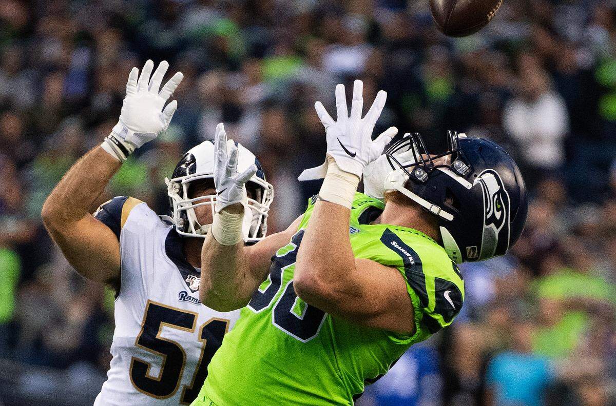 Seattle Seahawks tight end Will Dissly (88) makes a catch during the second quarter. The Seattle Seahawks played the Los Angeles Rams in a NFL football game at CenturyLink Field in Seattle, Wash., on Thursday, Oct. 3, 2019.