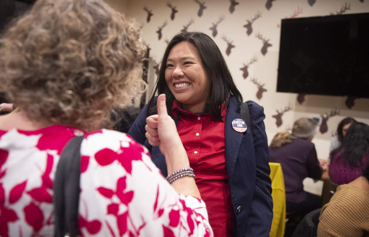 Port of Tacoma Commission candidate Kristin Ang is congratulated during an election night party at the Urban Elk in Tacoma on Nov. 5, 2019.