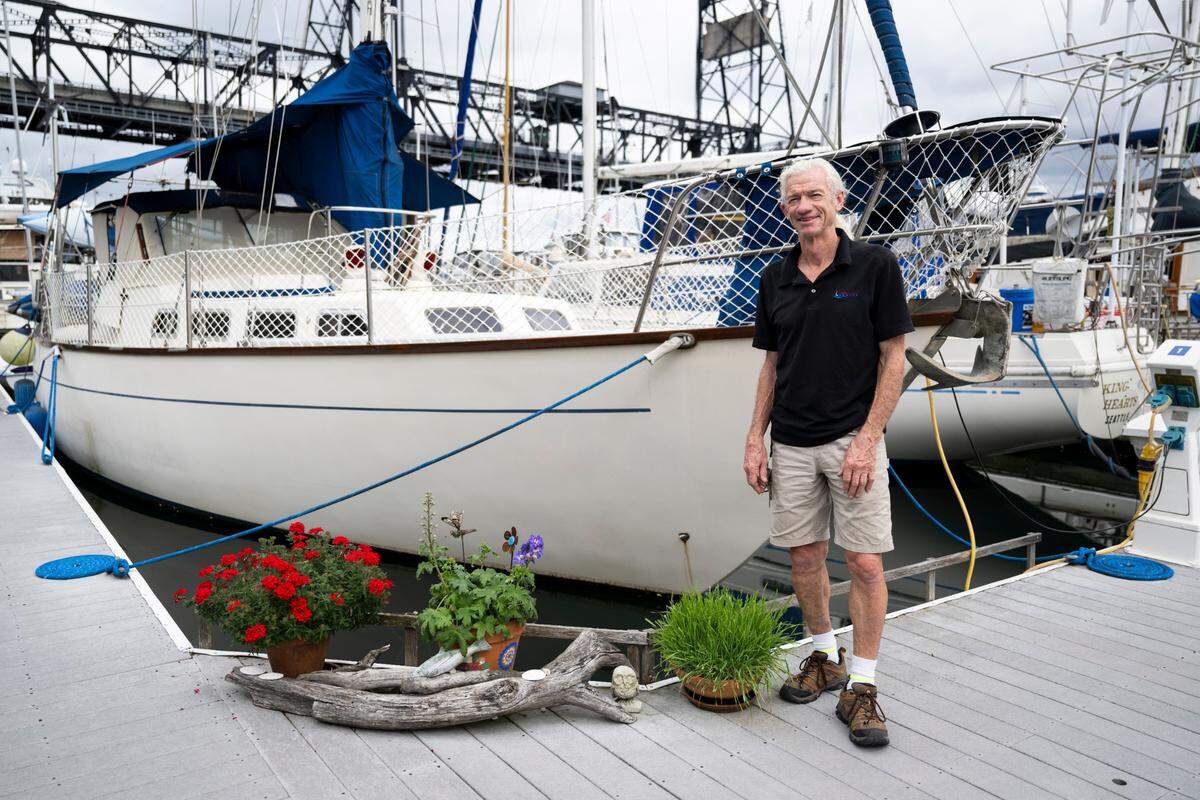 Scott Monett lives in his sailboat with his partner Kelly Mills and two cats, Tigger and Luna, at the Foss Harbor Marina. Photographed on Monday, Sept. 23, 2024, in Tacoma.