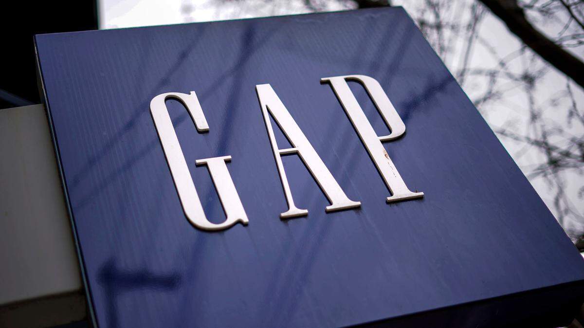 A sign for the GAP is seen on a storefront in Pittsburgh, Jan. 12, 2022. (AP Photo/Gene J. Puskar, File)