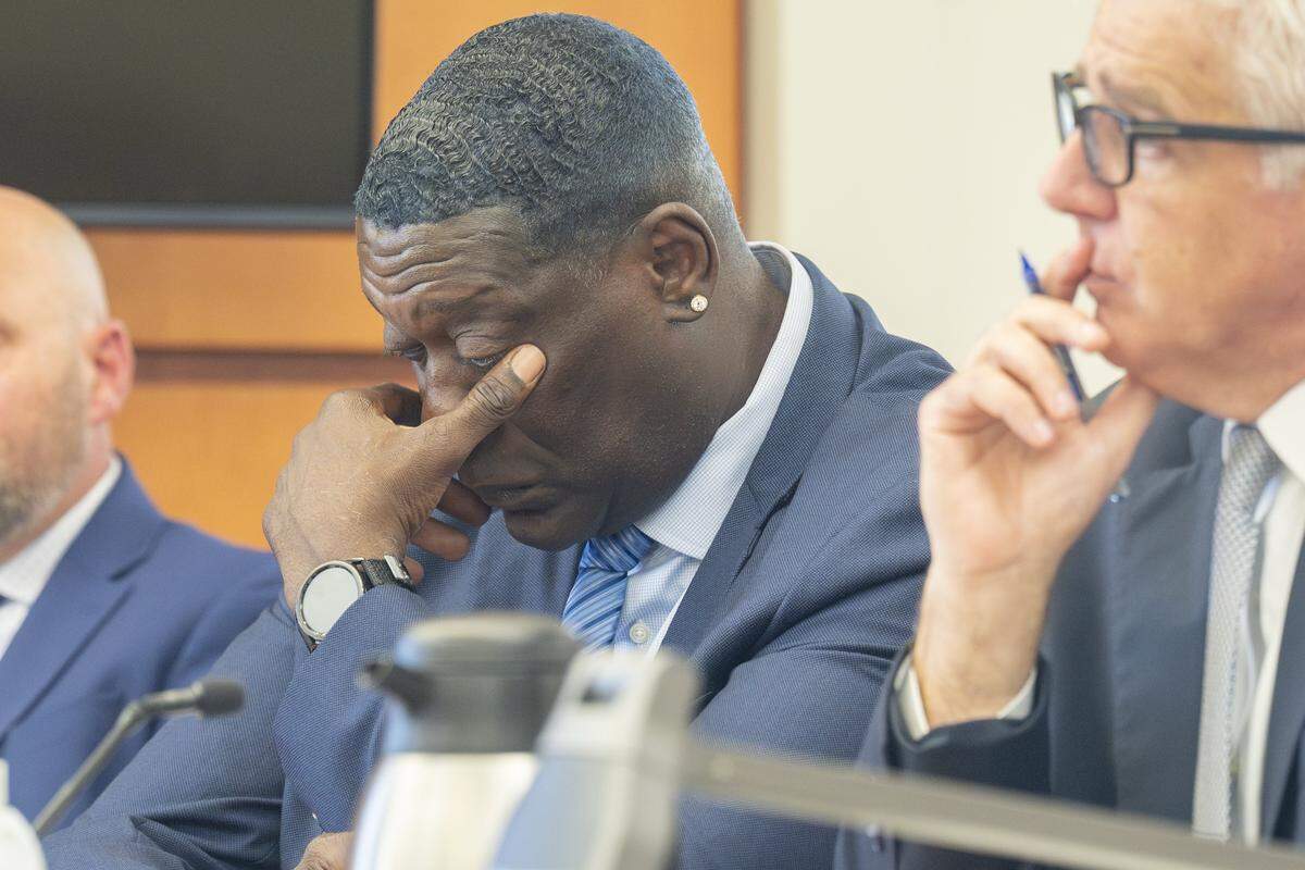 Former NBA star Shawn Kemp, 55, wipes his eyes after hearing statements from friends and family at Kemp's sentencing hearing on Friday, Aug. 22, 2025, at Pierce County Superior Court in Tacoma, Wash. Kemp pleaded guilty in May to second-degree assault for shooting at an occupied car on March 8, 2023, outside the Tacoma Mall after he'd tracked his stolen cell phone to the parking lot.
