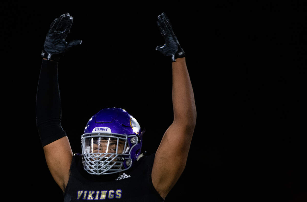 Puyallup’s Sermon Wilson pumps up the crowd in the fourth quarter. Puyallup played Graham-Kapowsin in a football game at Sparks Stadium in Puyallup, Wash., on Friday, Sept. 27, 2019.