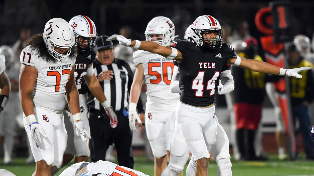 Yelm’s Onyx Carter (44) reacts to a sack on Eastside Catholic’s Jake Tiryakioglu (11) during the first half of the 3A semifinal state game at Art Crate Field, Saturday, Nov. 25, 2023, in Spanaway, Wash.