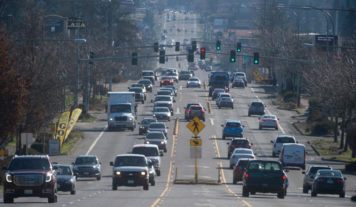 Traffic flows on Highway 7 through Parkland, Washington, looking south, on Wednesday, Feb. 23, 2022.