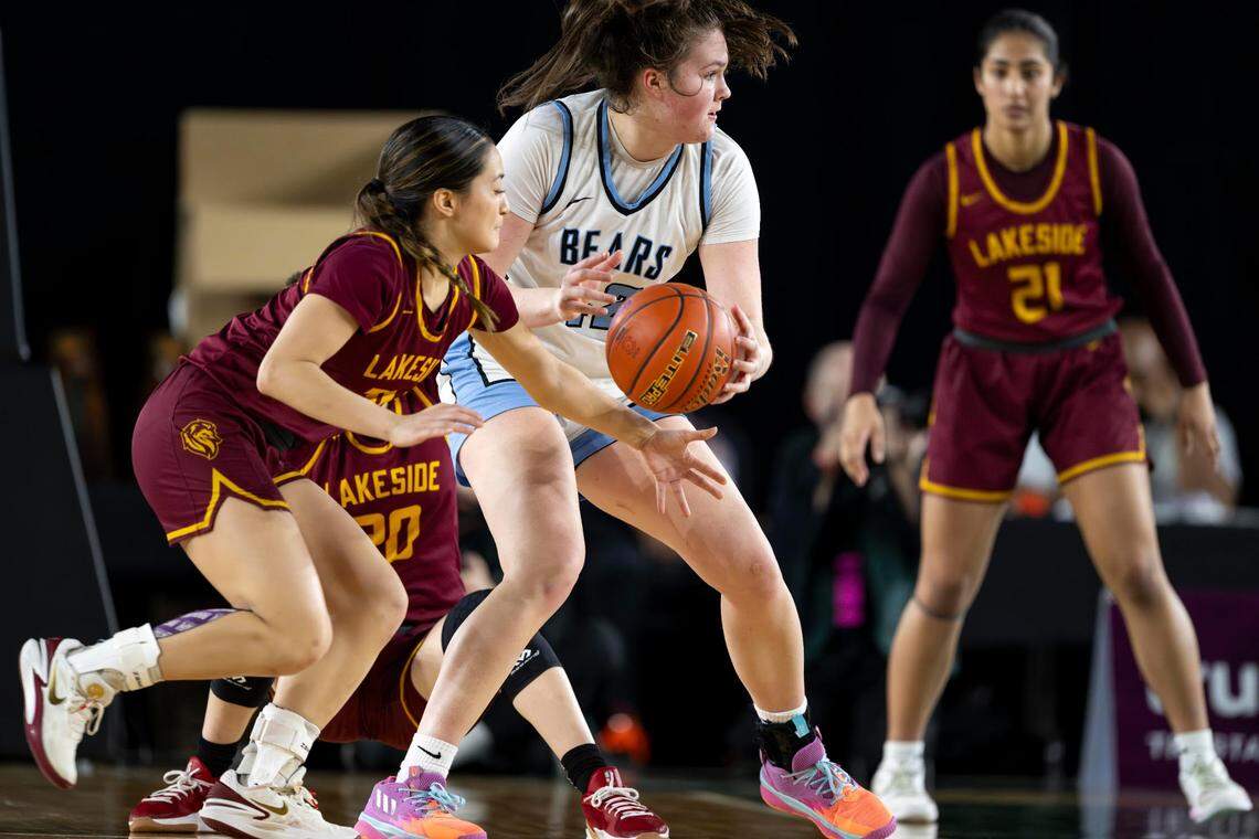 Lakeside guard Sophia David (23) attempts to steal the ball away from Central Valley forward Brynn McGaughy (42) during the third quarter of the Class 3A state championship game at the Tacoma Dome on Saturday, March 8, 2025, in Tacoma, Wash.