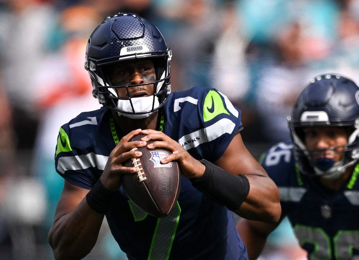 Seattle Seahawks quarterback Geno Smith (7) scrambles before throwing during the first quarter of the game against the Miami Dolphins at Lumen Field, on Sunday, Sept. 22, 2024, in Seattle, Wash.