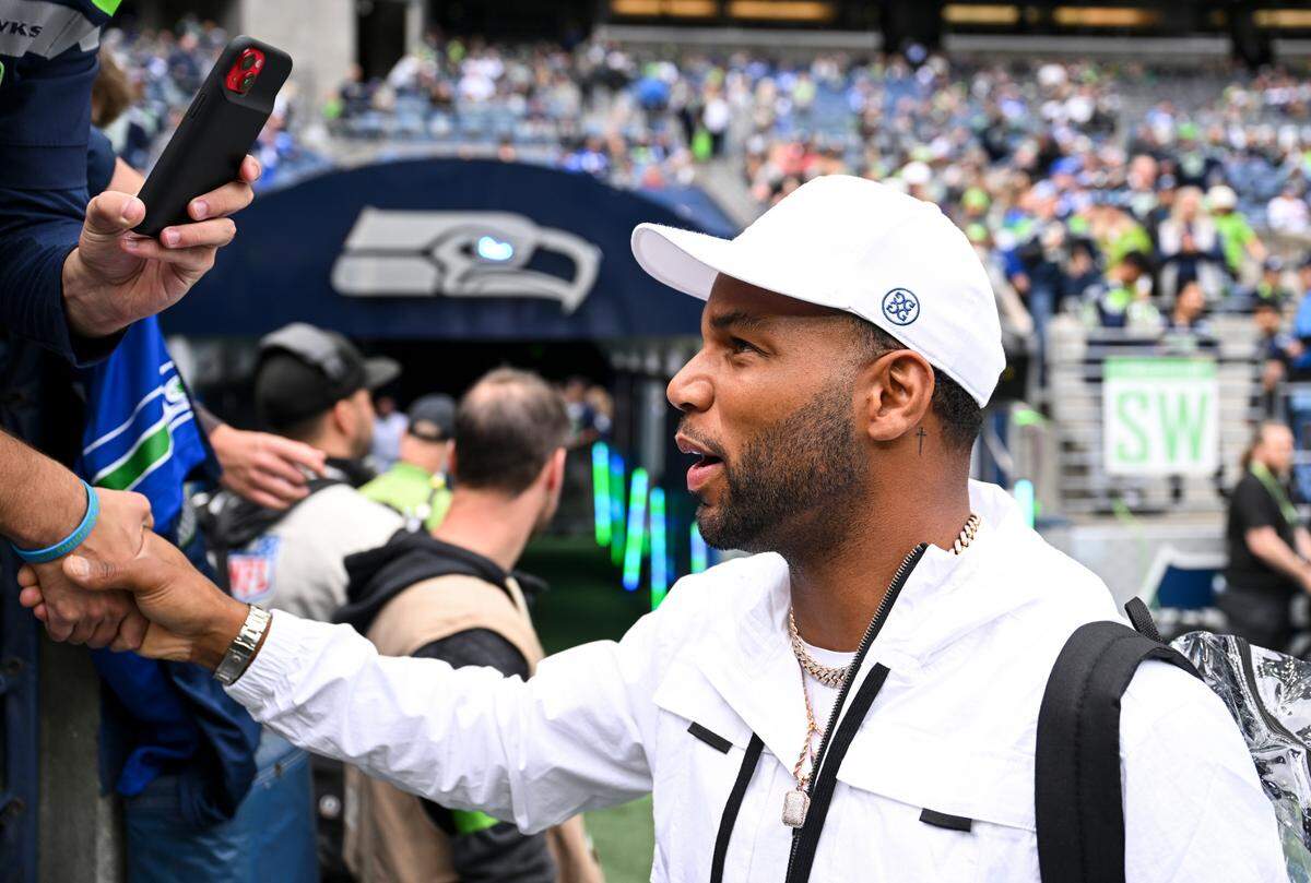 Golden Tate, wide receiver on the Super Bowl champion Seahawks, greets fans before the game between the Seattle Seahawks and the Carolina Panthers at Lumen Field, Sunday, Sept. 24, 2023, Seattle, Wash. 