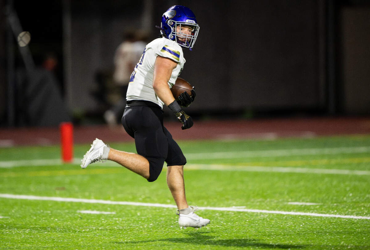 Puyallup’s Kyson Douglas (2) runs in a touchdown reception during the first half of the game at Sumner High School, on Thursday, Oct. 3, 2024, in Sumner, Wash.