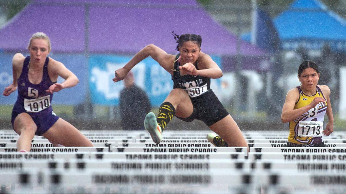 Emerald Ridge’s JaiCieonna Gero-Holt runs to a state championship in the 4A girls 100-meter hurdles during the second day of the WIAA State Track and Field Championships at Mount Tahoma High School in Tacoma, Washington on Friday, May 27, 2022.