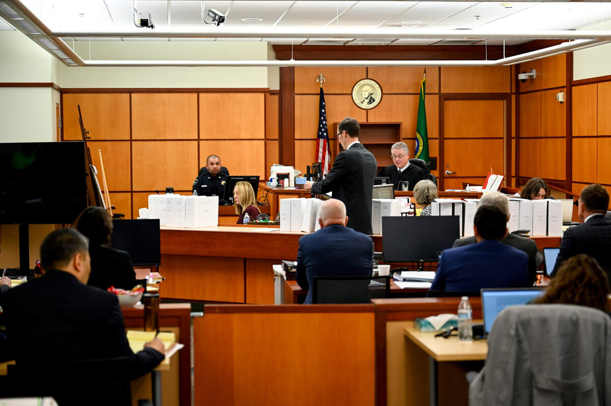 Pierce County Sheriff’s Deputy Gabriel Bol takes the stand during the trial of three Tacoma Police officers in the killing of Manny Ellis at Pierce County Superior Court, Monday, Nov. 13, 2023, in Tacoma, Wash. Tacoma Police Officers Christopher Burbank, Matthew Collins and Timothy Rankine stand trial for charges related to the March 2020 killing of Manny Ellis. (Brian Hayes / Pool Photo – The News Tribune)