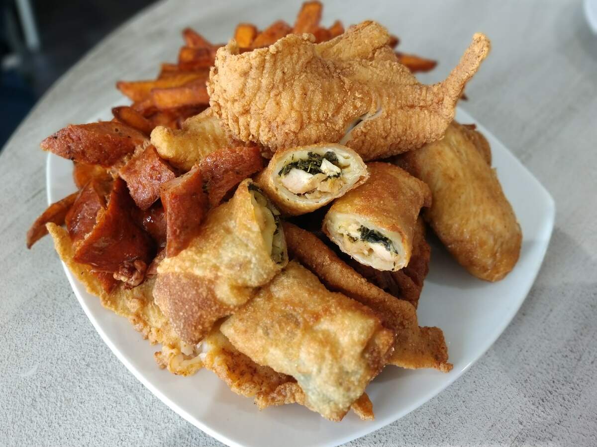 Mama’s Sampler Platter is built for sharing at Collard Greens & Other Things in Tacoma’s Dome District neighborhood.