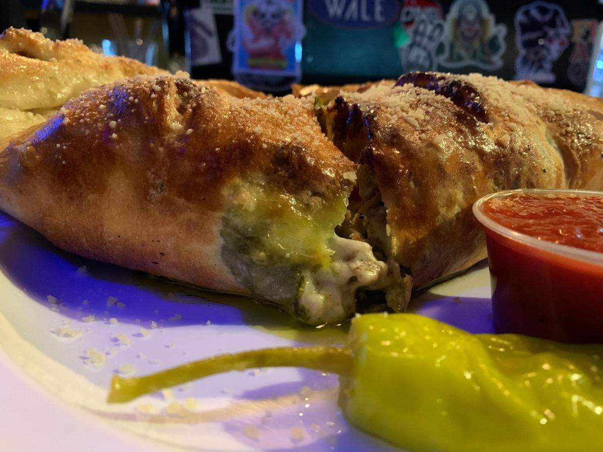 Most any pizza can become a calzone at Half Pint Pizza Pub on Tacoma’s Sixth Avenue, a strip well-loved for its plentiful bars and restaurants.