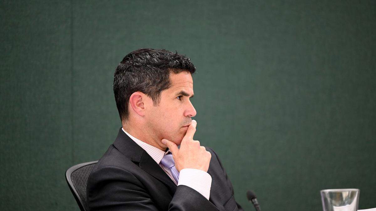 Pierce County Council member Ryan Mello listens to senior legislative assistant Mike Kruger regarding ordinance No. 2023-24 during a Pierce County Council meeting, Tuesday, July 25, 2023, in Tacoma.