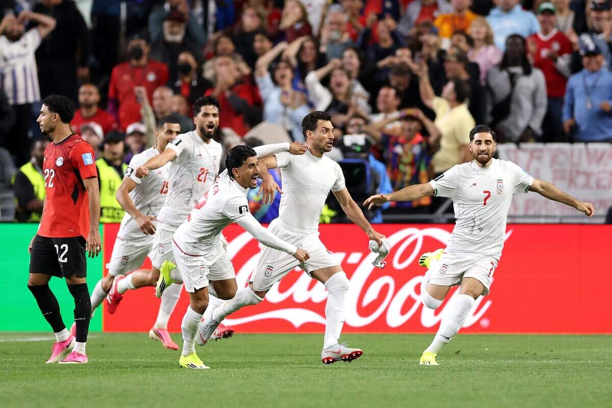 SEATTLE, WASHINGTON - JUNE 26: Shoja Khalilzadeh #4 of IR Iran celebrates scoring before the goal is disallowed by VAR for offside during the FIFA World Cup 2026 Group G match between Egypt and IR Iran at Seattle Stadium on June 26, 2026 in Seattle, Washington. (Photo by Richard Heathcote/Getty Images)