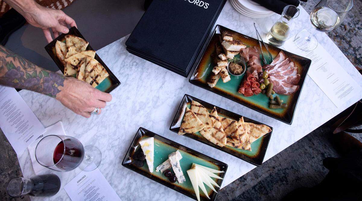 Appetizers at Stanford’s Tacoma, located at 1502 Pacific Avenue downtown include a charcuterie board and cheese plate ideal for sharing with $1 off glasses of wine at happy hour.