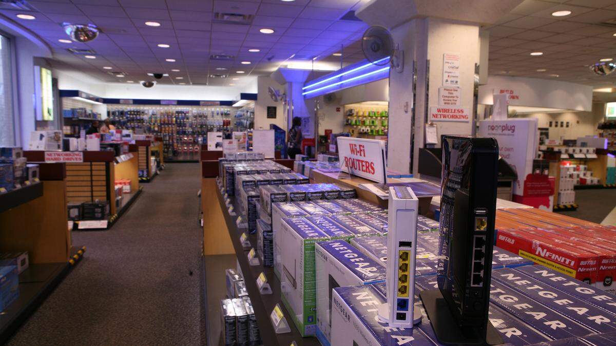 FILE Ñ Routers on display at J&R Music and Computer World in New York, April 5, 2011. Hundreds of thousands of home and office routers have been infected by the malware, which was created by the same group that hacked the Democratic National Committee. (Ozier Muhammad/The New York Times)