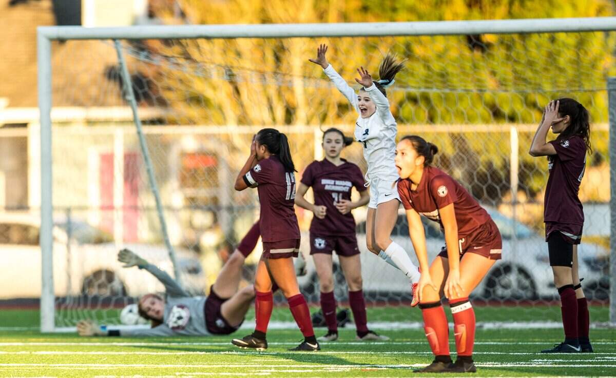 Gig Harbor’s Ashley Wright jumps up celebrating her goal, giving the Tide’s the lead over Holy Names Academy during the state Class 3A girls soccer state championships at Sparks Stadium in Puyallup on Saturday, Nov. 17, 2018. Gig Harbor won 2-1.
