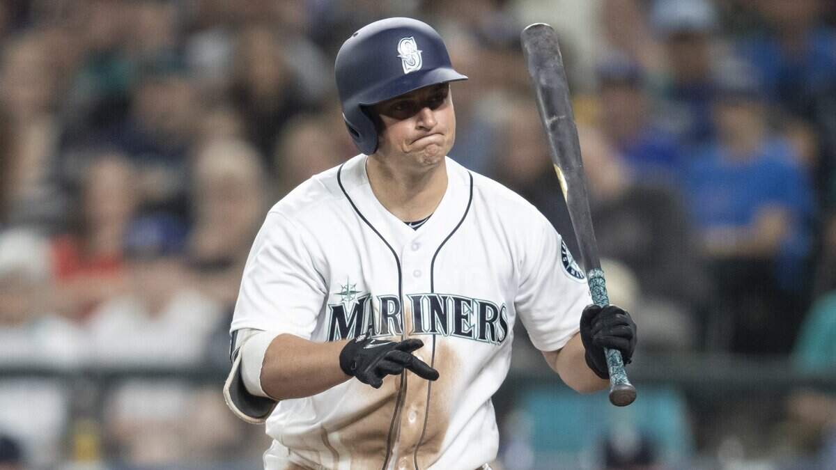 Seattle Mariners’ Kyle Seager reacts between pitches during a baseball game against the Los Angeles Dodgers, Saturday, Aug. 18, 2018, in Seattle. The Mariners won 5-4 in 10 innings. (AP Photo/Stephen Brashear)