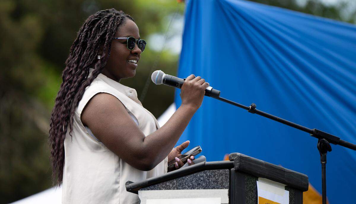 Tacoma city councilmember Jamika Scott speaks during a “No Kings” protest at People’s Park, on Saturday, June 14, 2025, in Tacoma, Wash.