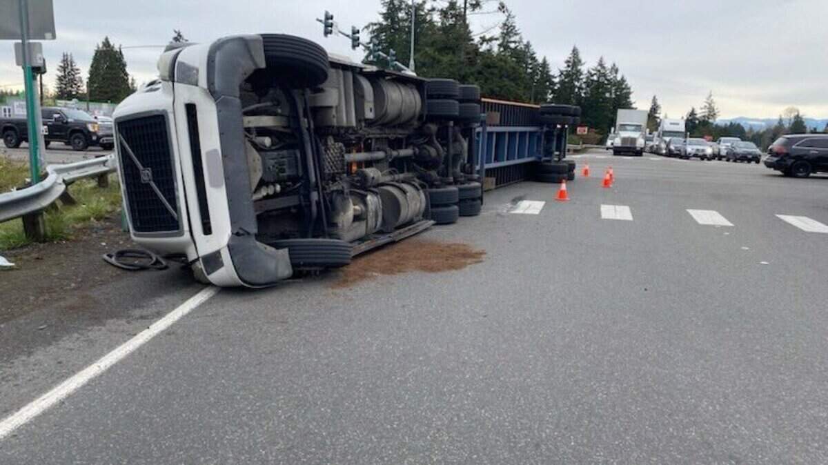 An overturned semi-truck has caused a ramp to westbound state Route 512 in Pierce County to close on Nov. 19.
