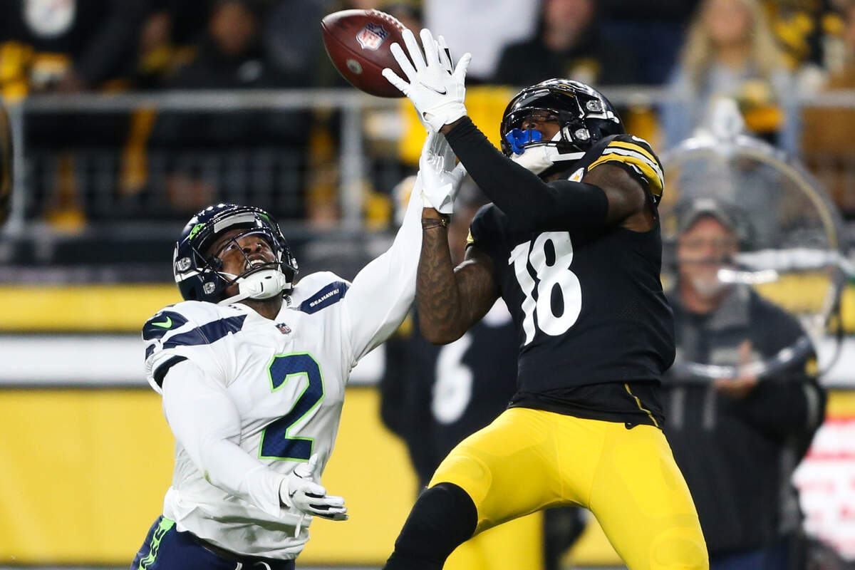 Seattle Seahawks cornerback DJ Reed breaks up a pass intended for Pittsburgh Steelers wide receiver Diontae Johnson (18) during the first quarter. The Seattle Seahawks played the Pittsburgh Steelers at Heinz Field in Pittsburgh, Pa., on Sunday, Oct. 17, 2021.