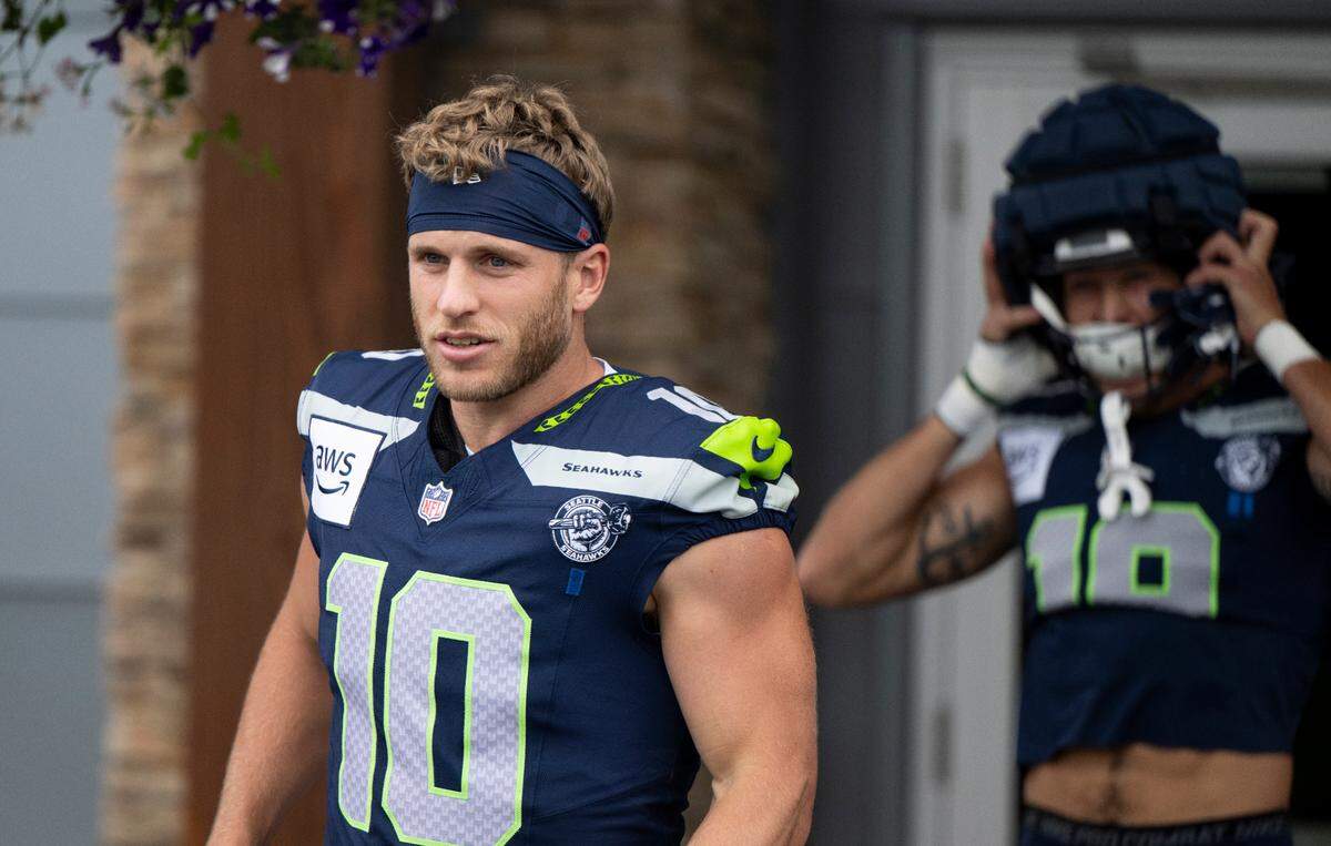 Seattle Seahawks wide receiver Cooper Kupp (10) walks out during training camp at Virginia Mason Athletic Center on Friday, July 25, 2025, in Renton.