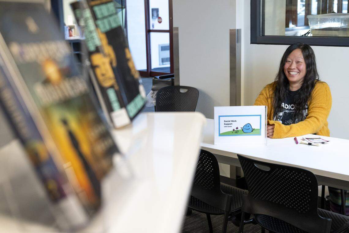 Samie Iverson, the library social worker for Tacoma Public Library, poses for a portrait on Friday, Dec. 5, 2025, at the Main Branch in Tacoma, Wash. Iverson offers social work support from tables set up regularly at Tacoma library branches.